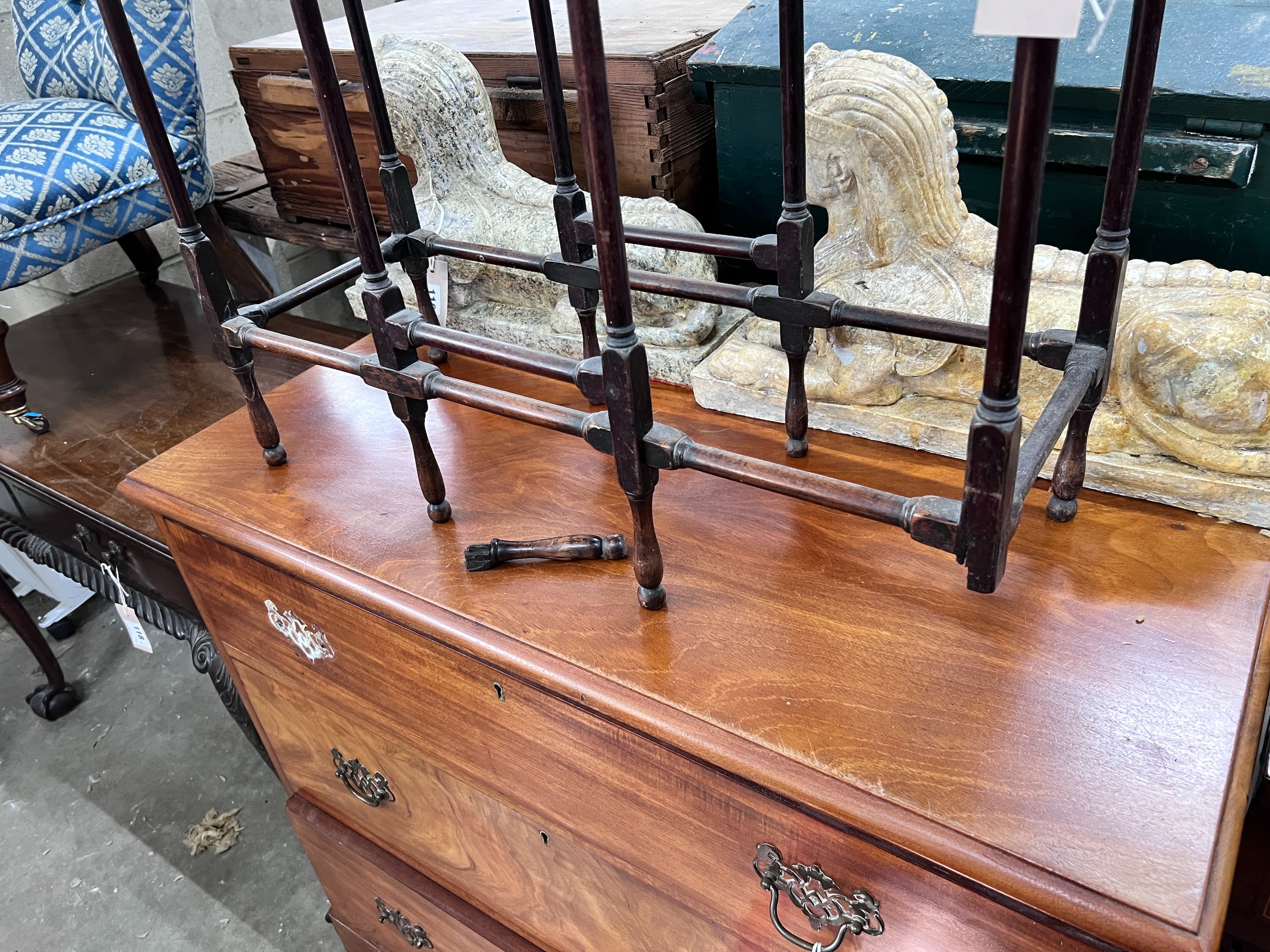 A mahogany spider leg table, width 71cm, depth 27cm, height 71cm *Please note the sale commences at 9am.
